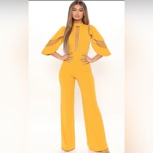 Size small mustard yellow jumpsuit- show stopper never worn